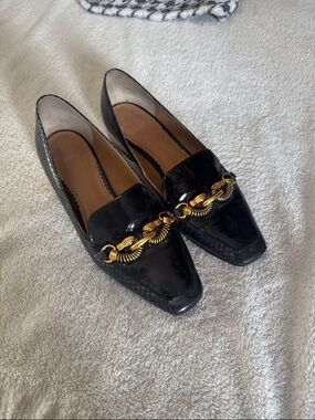 Tory Burch Black Patent Leather Slip-On Loafers with Gold Chain Accent. Size 8.5